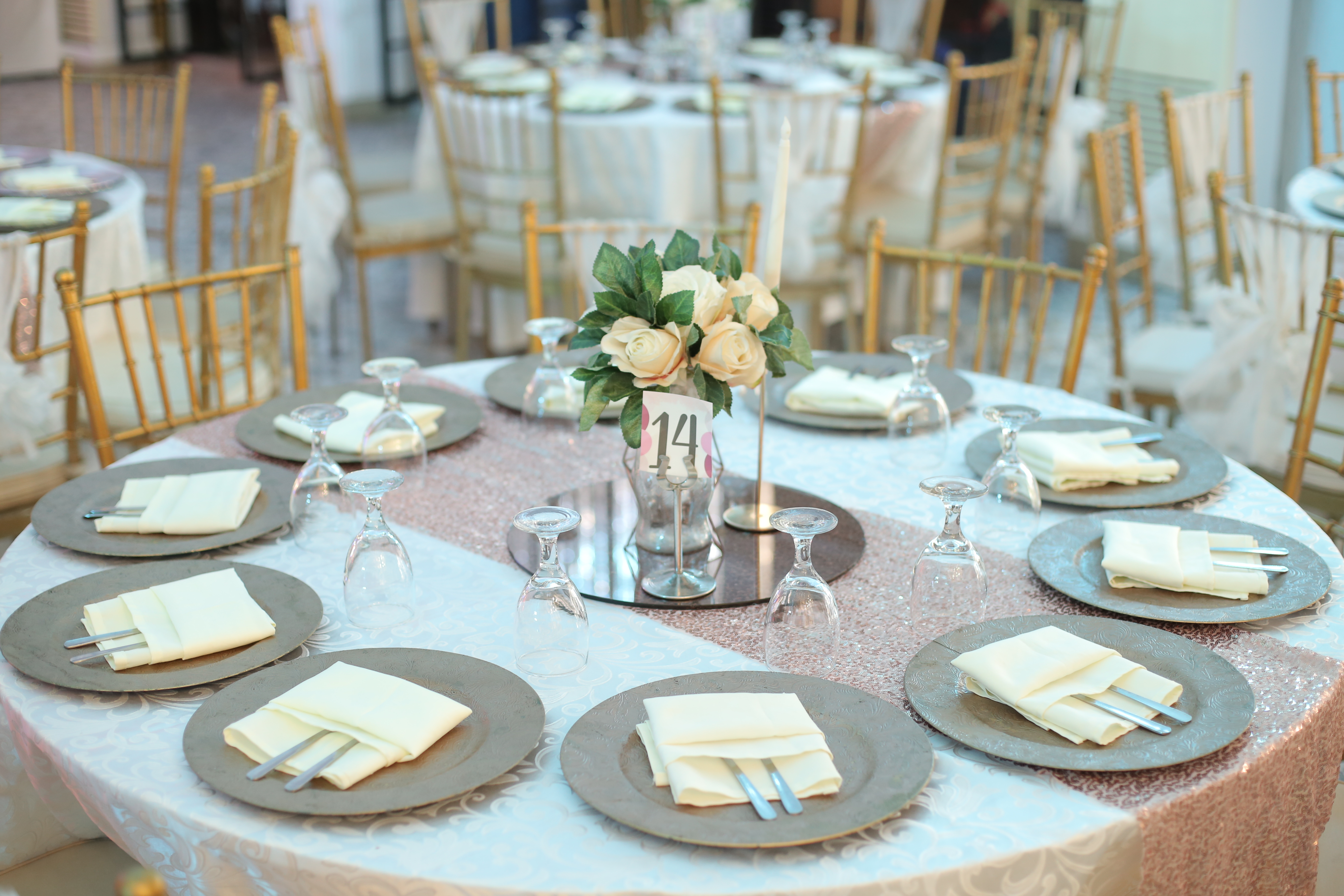 Rose gold table setting with table number