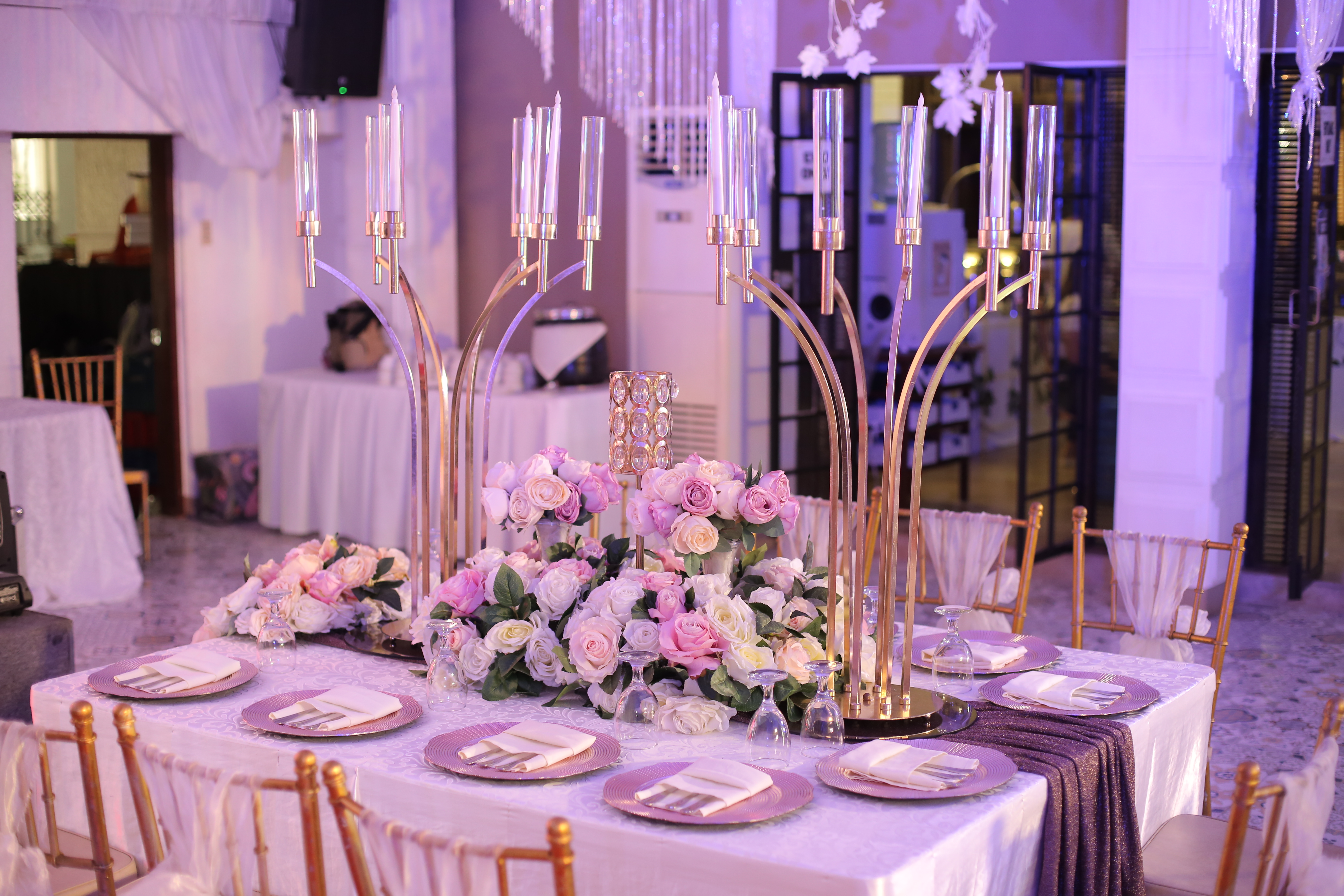 Blush candelabra centerpiece with roses